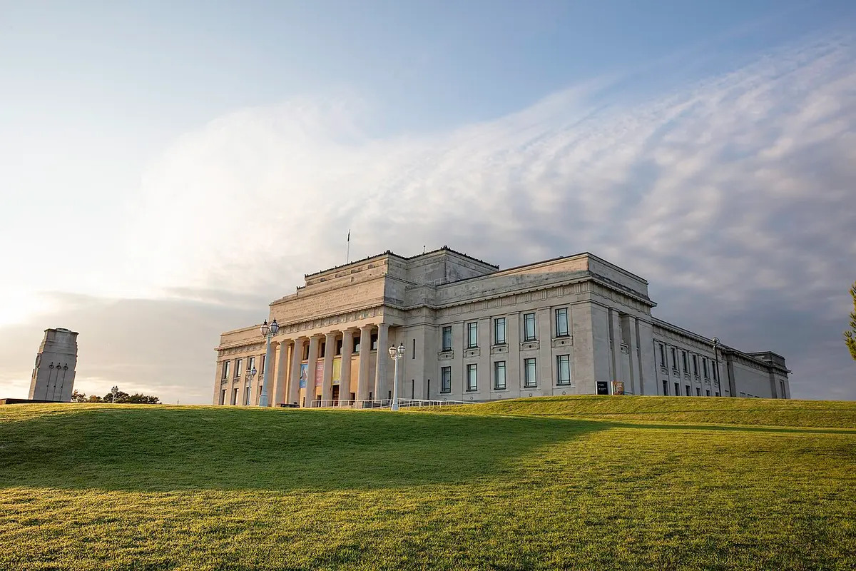 The neoclassical facade of Auckland War Memorial Museum above its lawn