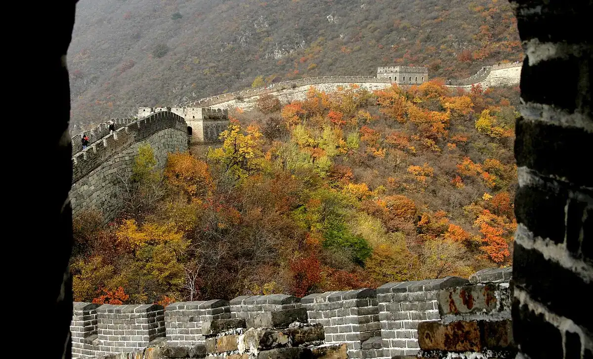 The Great Wall at Mutianyu winding along hills in autumn colours