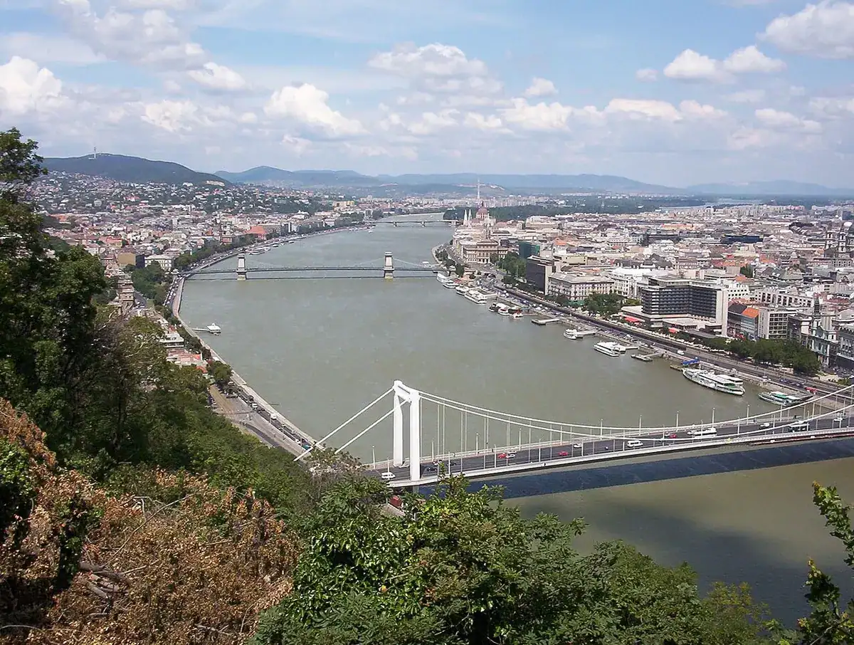 The Danube and its bridges with Pest across the river, seen from Gellért Hill