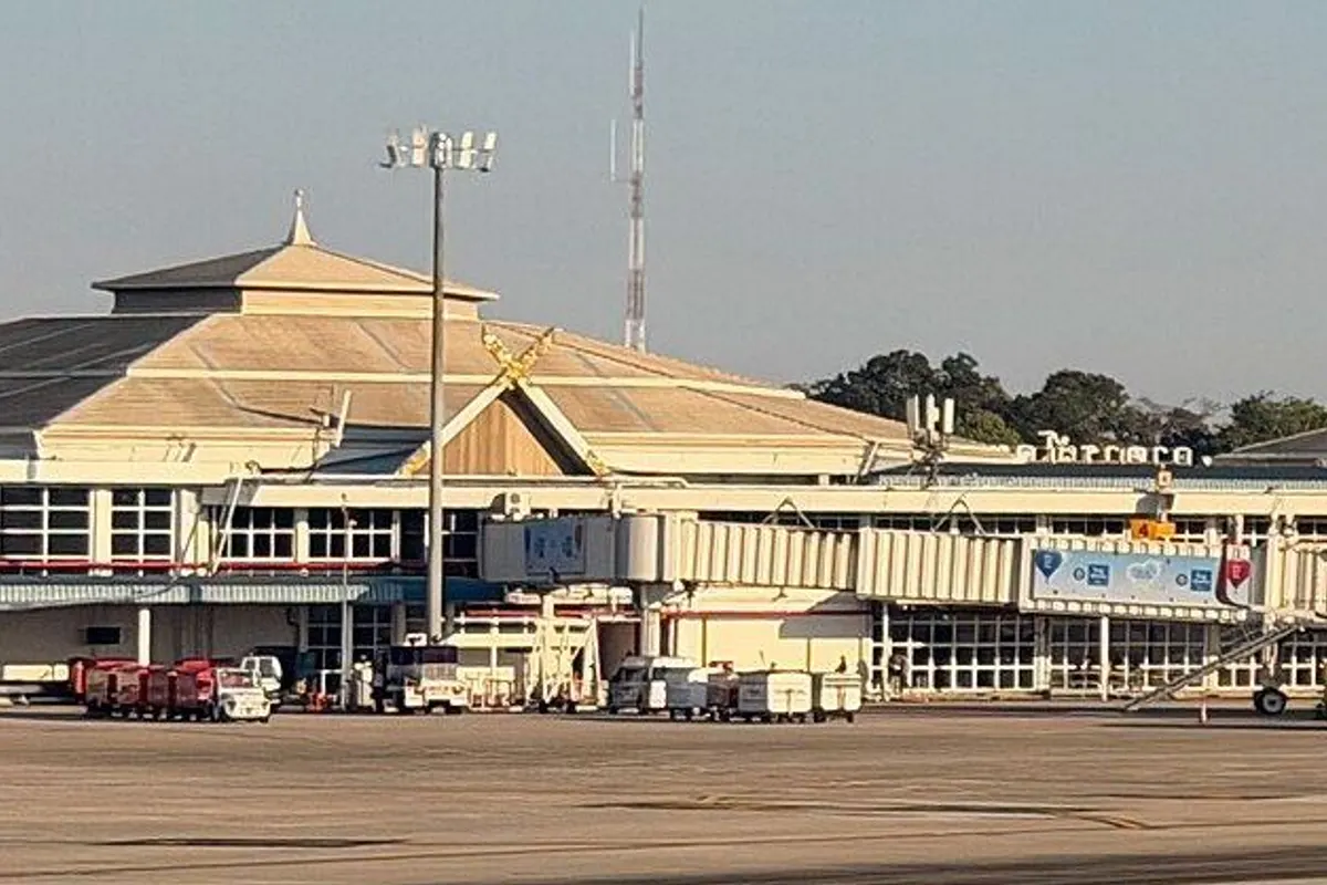 The Chiang Mai airport terminal with its Lanna-style roofs, seen across the airfield.