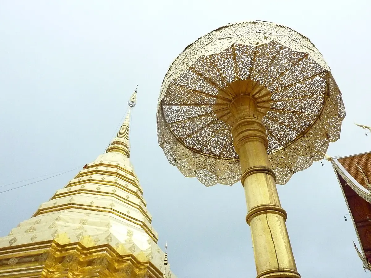 The golden chedi of Wat Phra That Doi Suthep with a gilded parasol