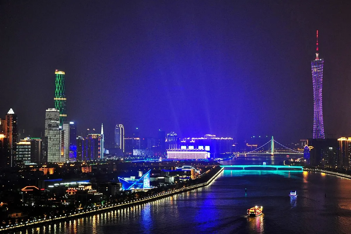 The lit-up Pearl River at night, with Canton Tower on the right.