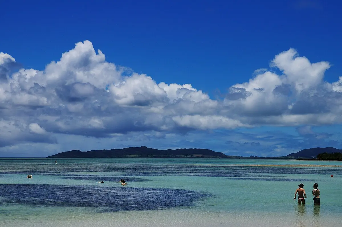 White sand and clear shallow water at Kondoi Beach on Taketomi Island.