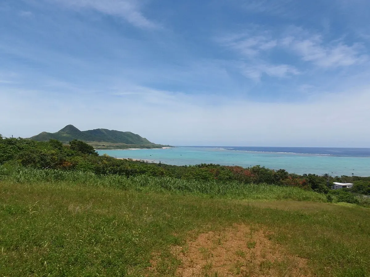 The Hirakubo Peninsula and coral-reef sea seen from Tamatorizaki.