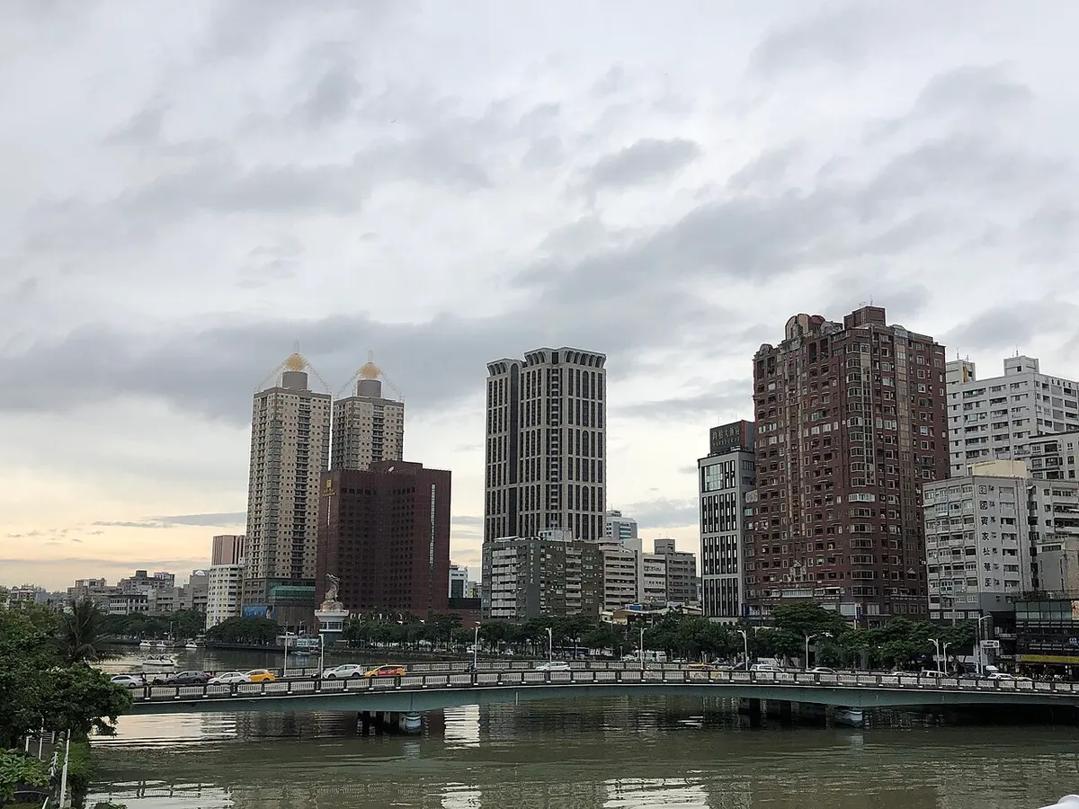 The Love River and the Kaohsiung skyline along its banks in daytime
