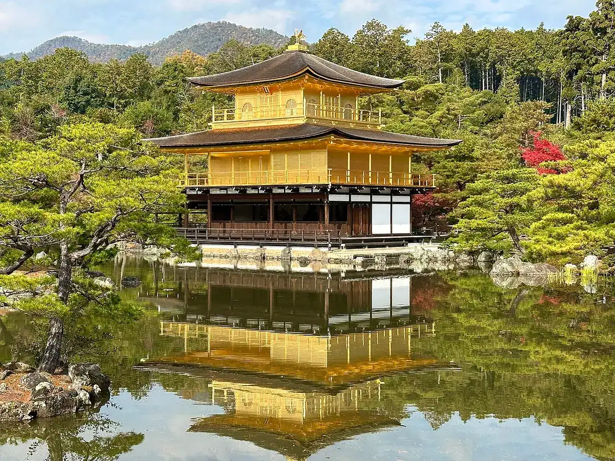 The golden Kinkaku-ji pavilion reflected in its pond