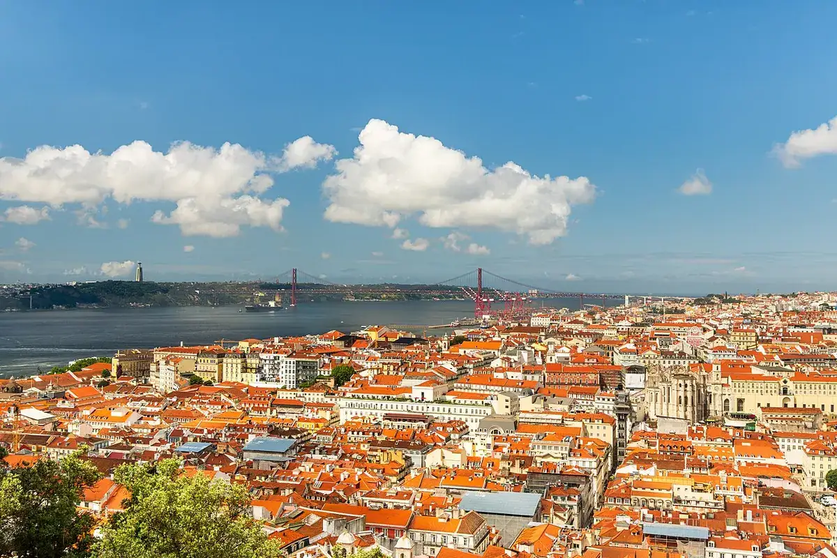 Lisbon's rooftops and the Tagus River seen from the castle hill