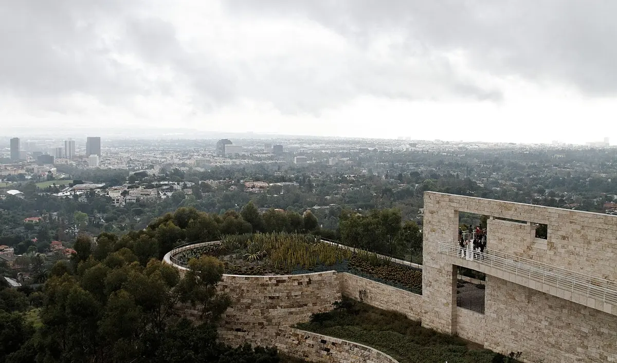Los Angeles spreading out beyond the Getty Center's stone terraces on a cloudy day