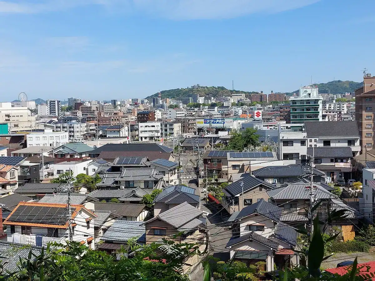 Matsuyama's cityscape with the castle on its hill, seen from Tenzan Shrine.