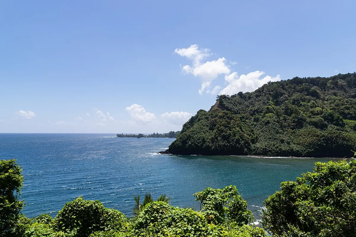 Jungle-covered headlands and blue sea along the Road to Hāna coast