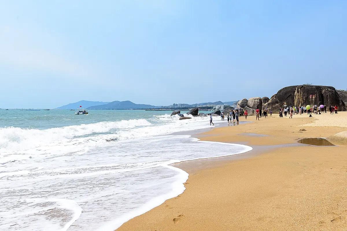 The beach and the huge granite boulder carved with the characters 'Tianya'