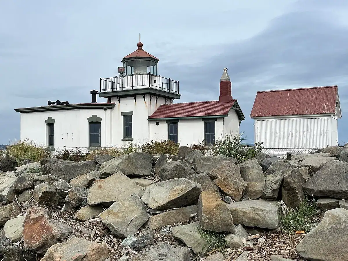 The white West Point Lighthouse at the tip of Discovery Park