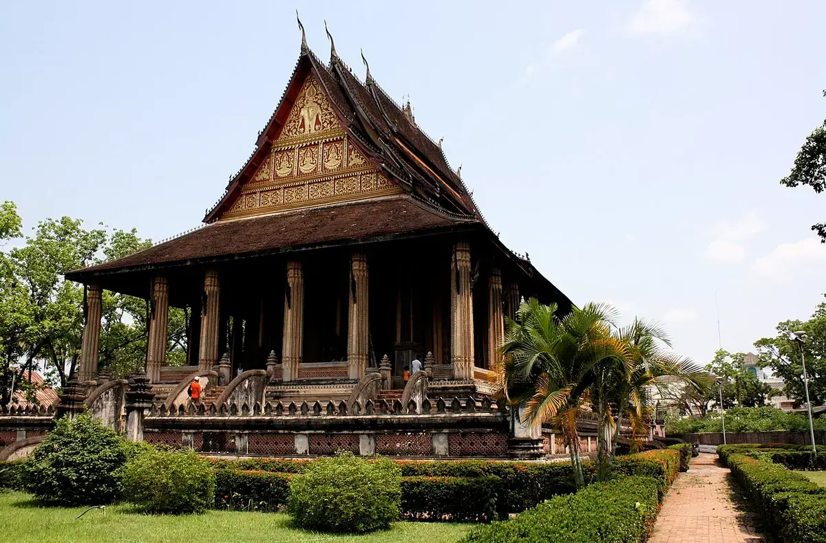 The exterior of Haw Phra Kaew in Vientiane set in its garden.