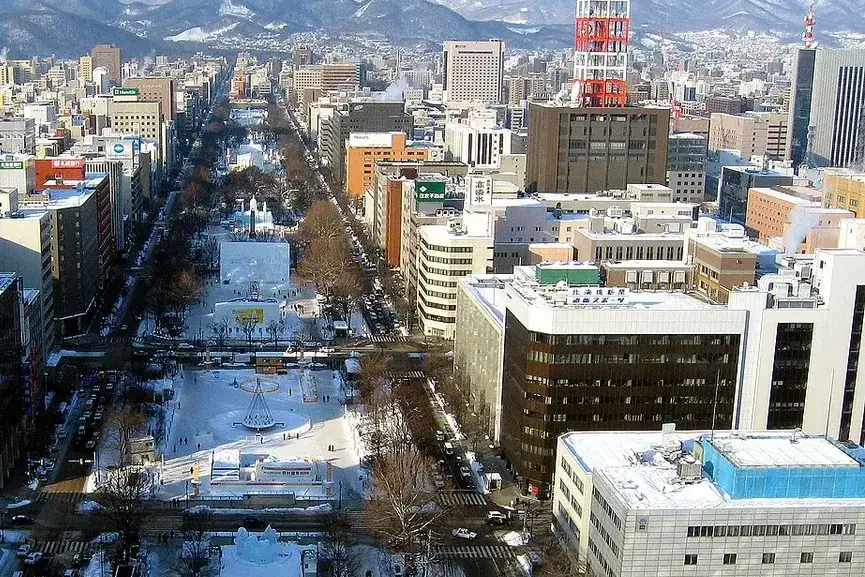 Snow-covered Odori Park stretching through downtown Sapporo.