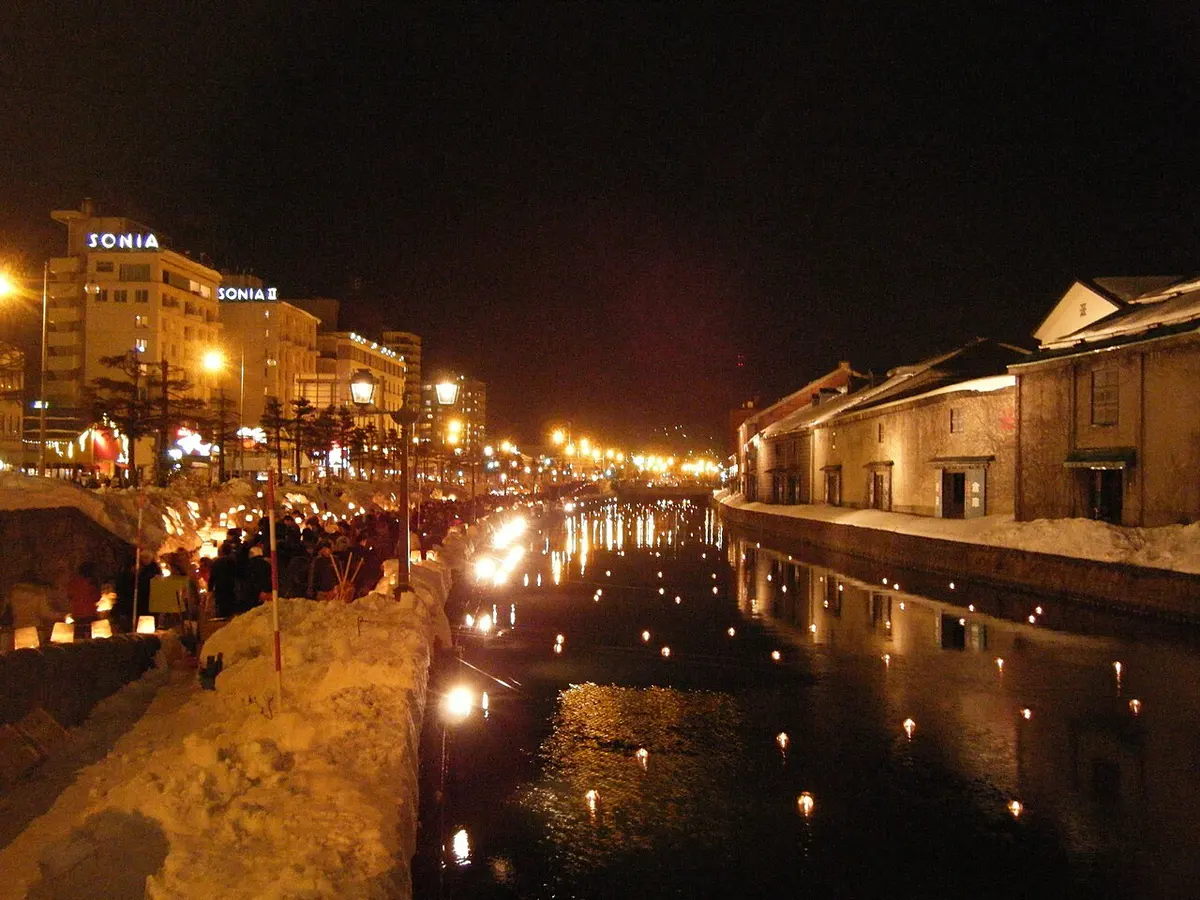 Otaru Canal lit by snow lanterns on a winter night.
